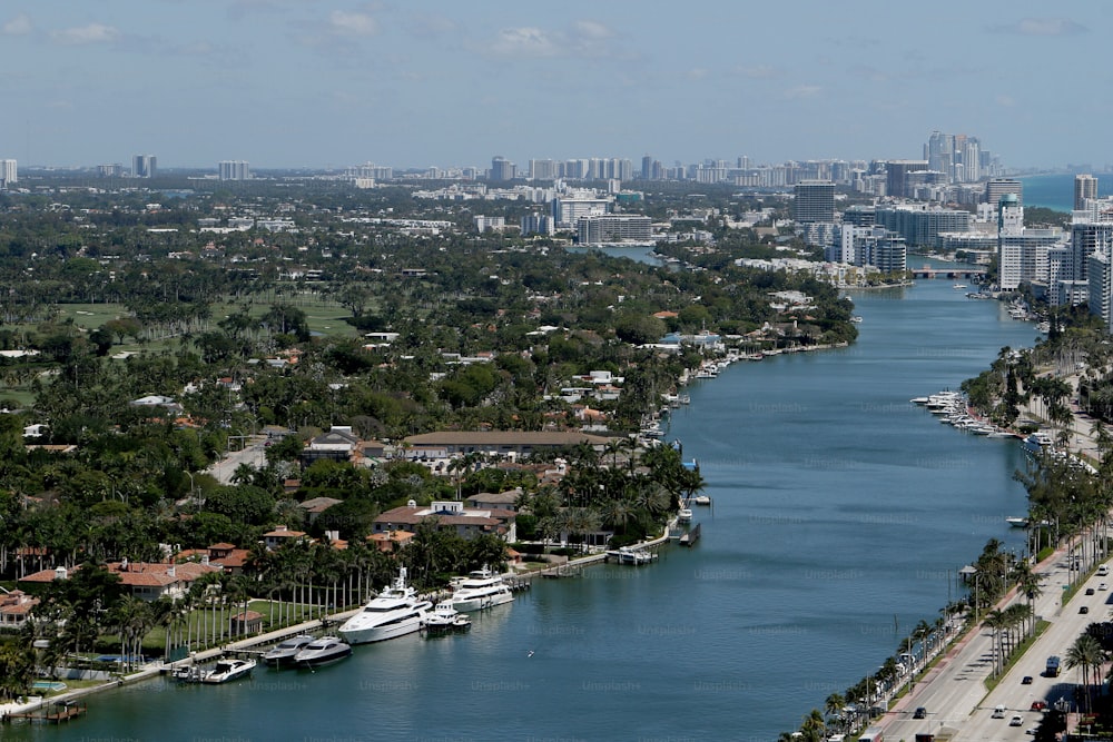 a river running through a city next to tall buildings