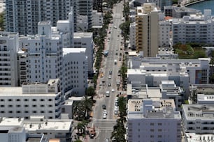 an aerial view of a city with tall buildings