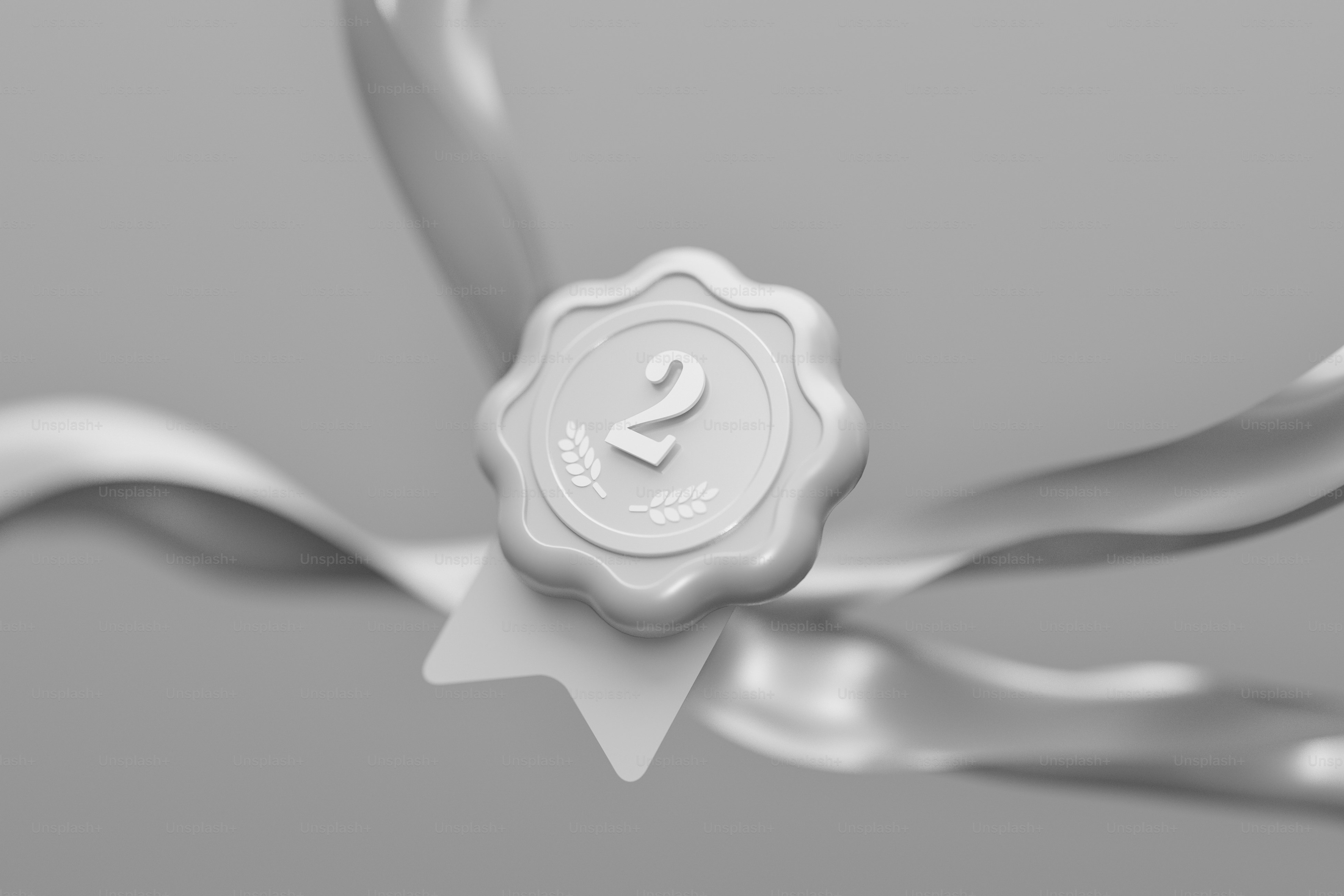 a close up of a ribbon with a wax stamp on it