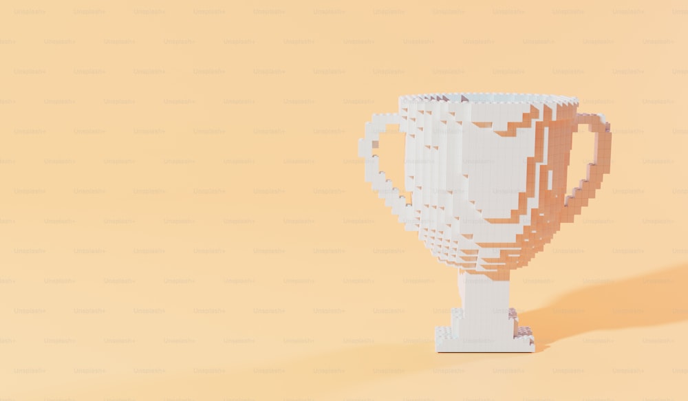 a cup made out of lego blocks on a yellow background