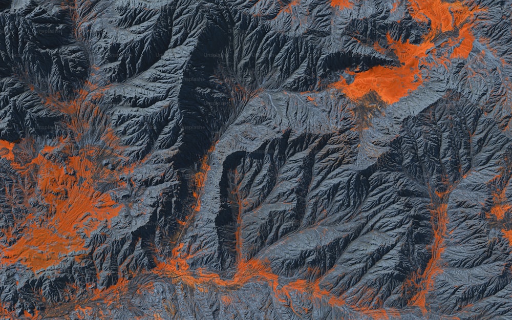 an aerial view of a mountain range covered in lava