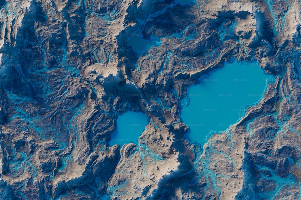 uma vista aérea de um lago azul cercado por montanhas