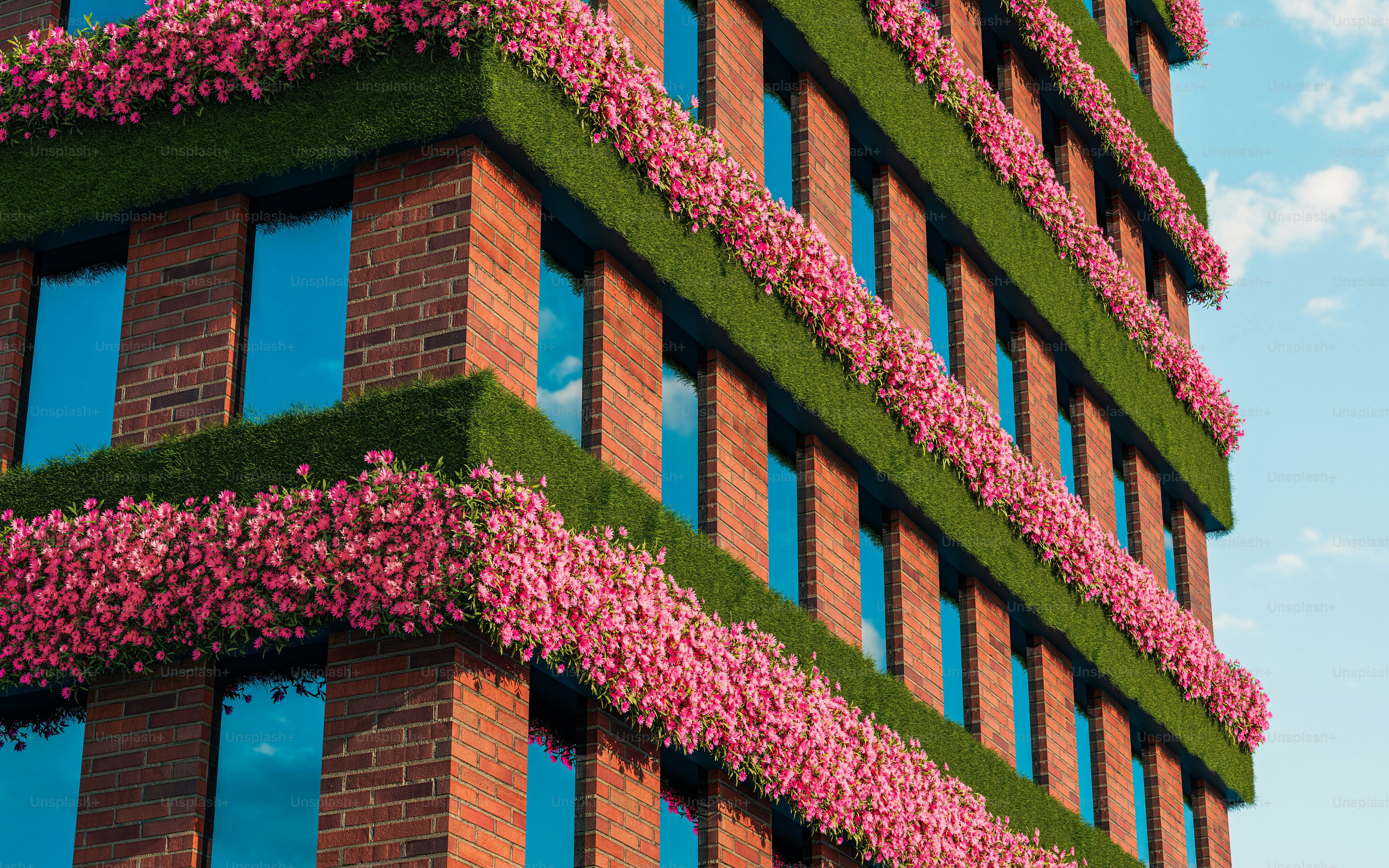 a building with pink flowers growing on the side of it
