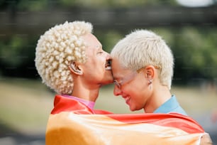 a couple of women standing next to each other