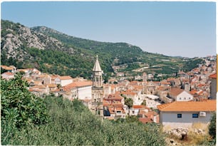 a view of a city with a mountain in the background