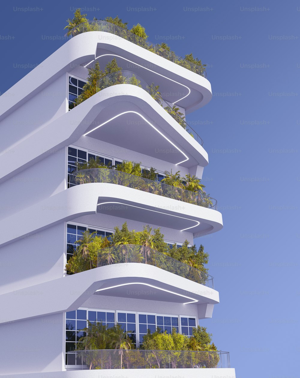 a tall white building with plants growing on the balconies