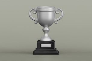 a silver trophy with a black base on a gray background