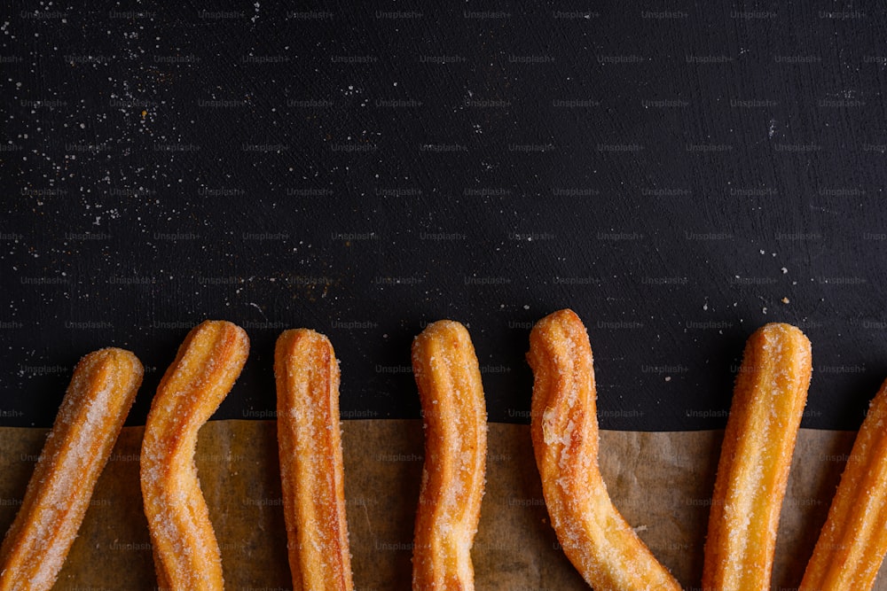 a group of churros sitting on top of a piece of paper