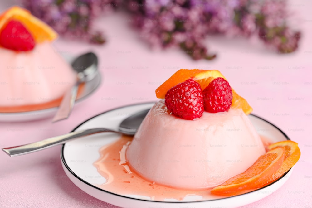 a dessert with fruit on top of it on a plate