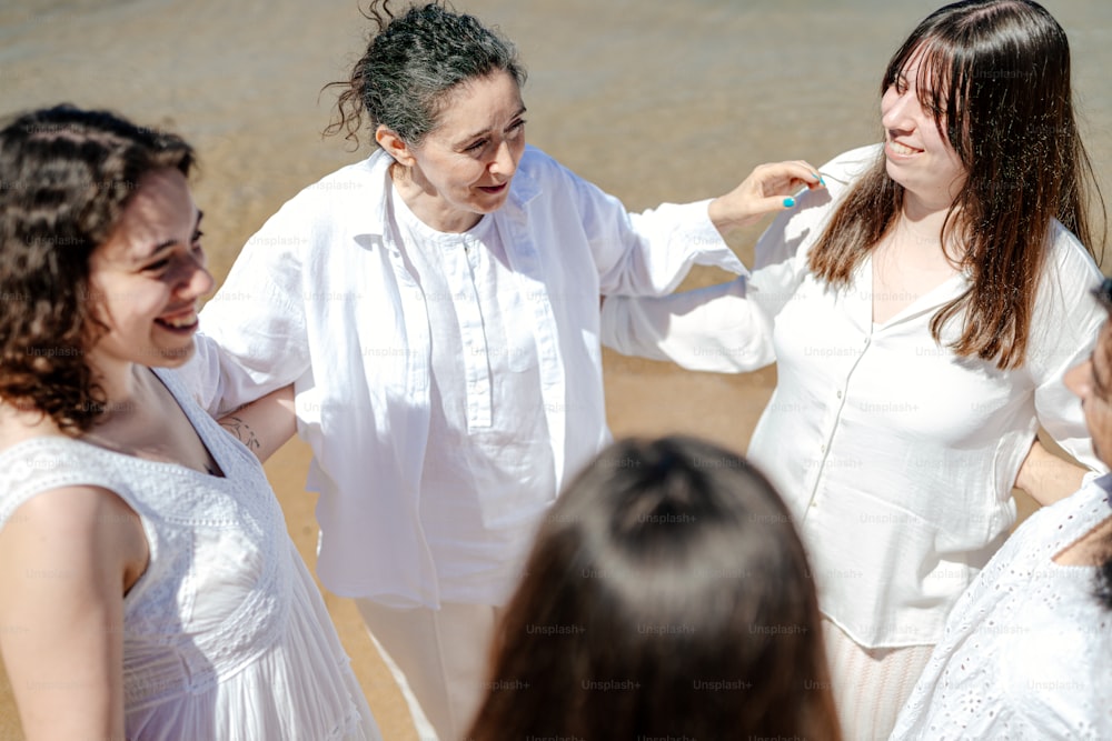 a group of women standing next to each other