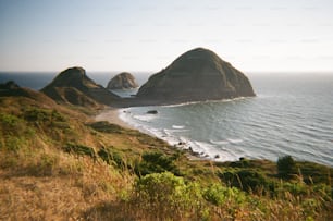 a view of the ocean from a hill