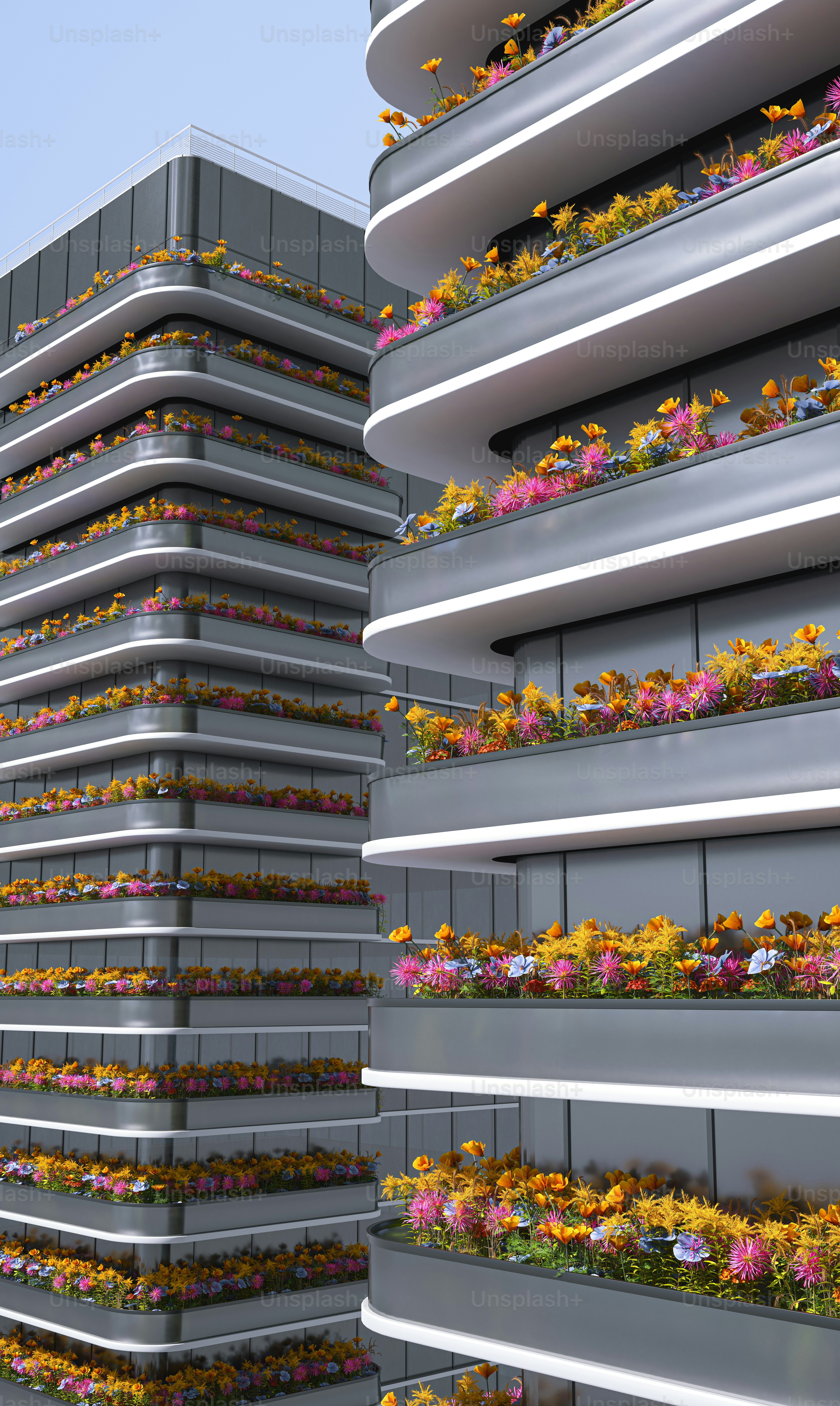 a tall building with a bunch of flowers growing on it