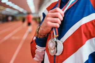 a man with a medal around his neck