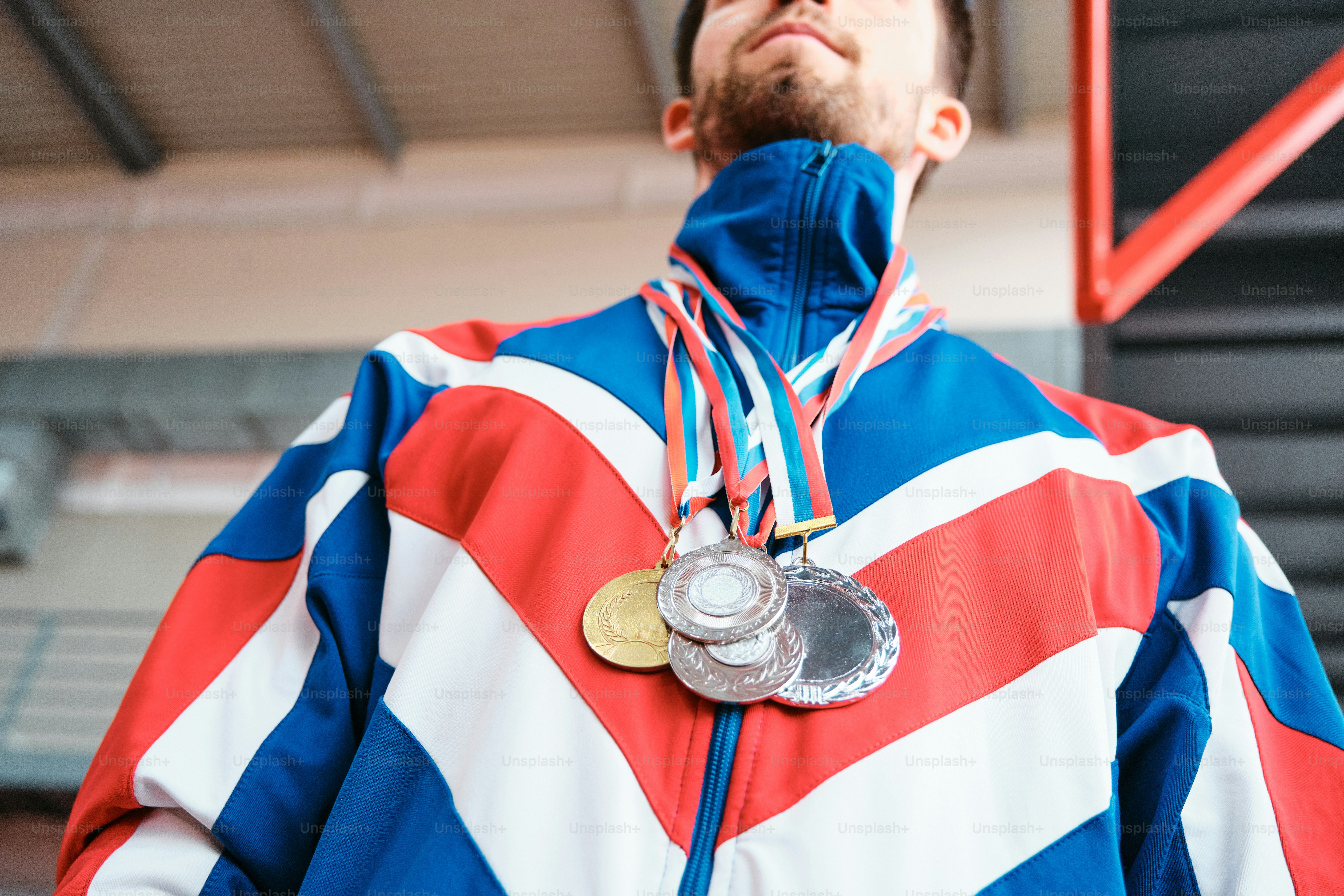 a man with a medal and a medal around his neck