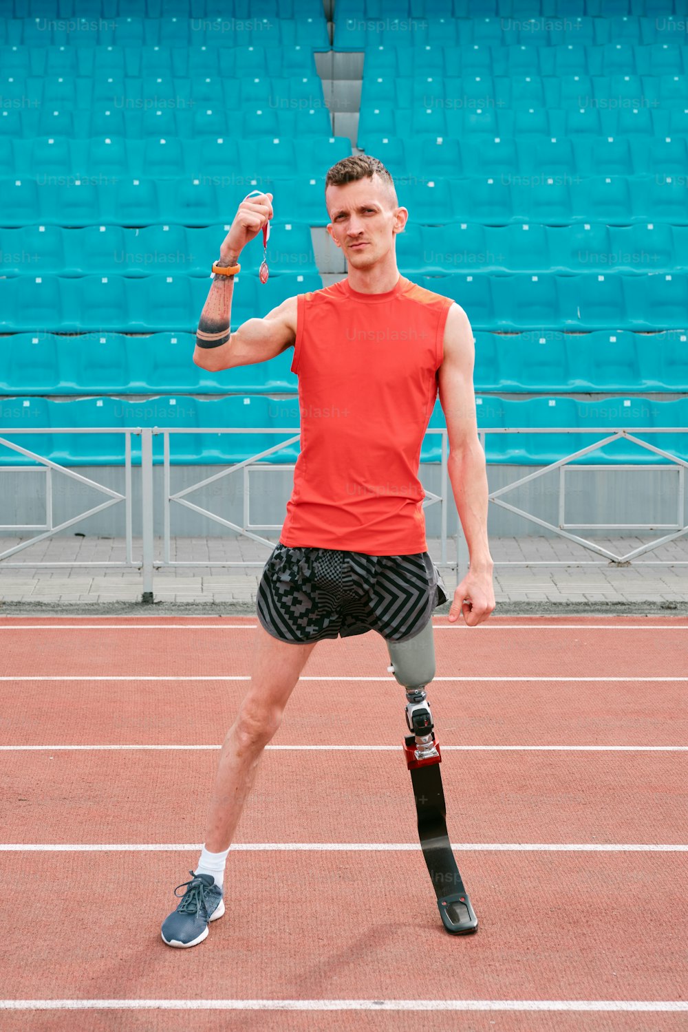 a man standing on top of a tennis court holding a racquet