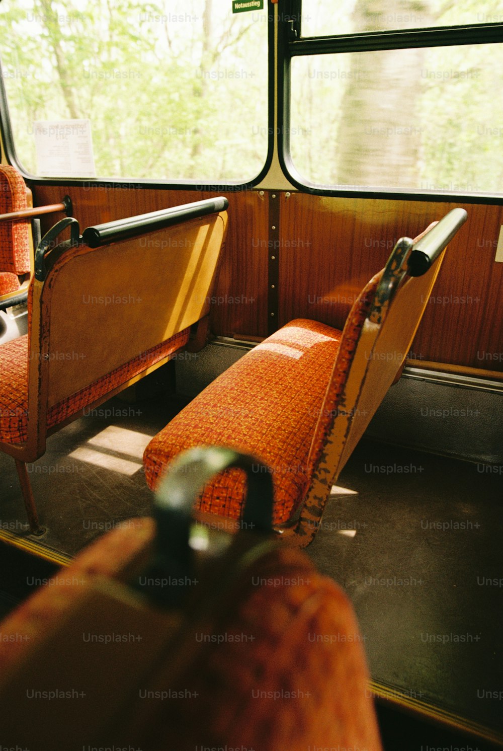 a couple of orange chairs sitting next to each other