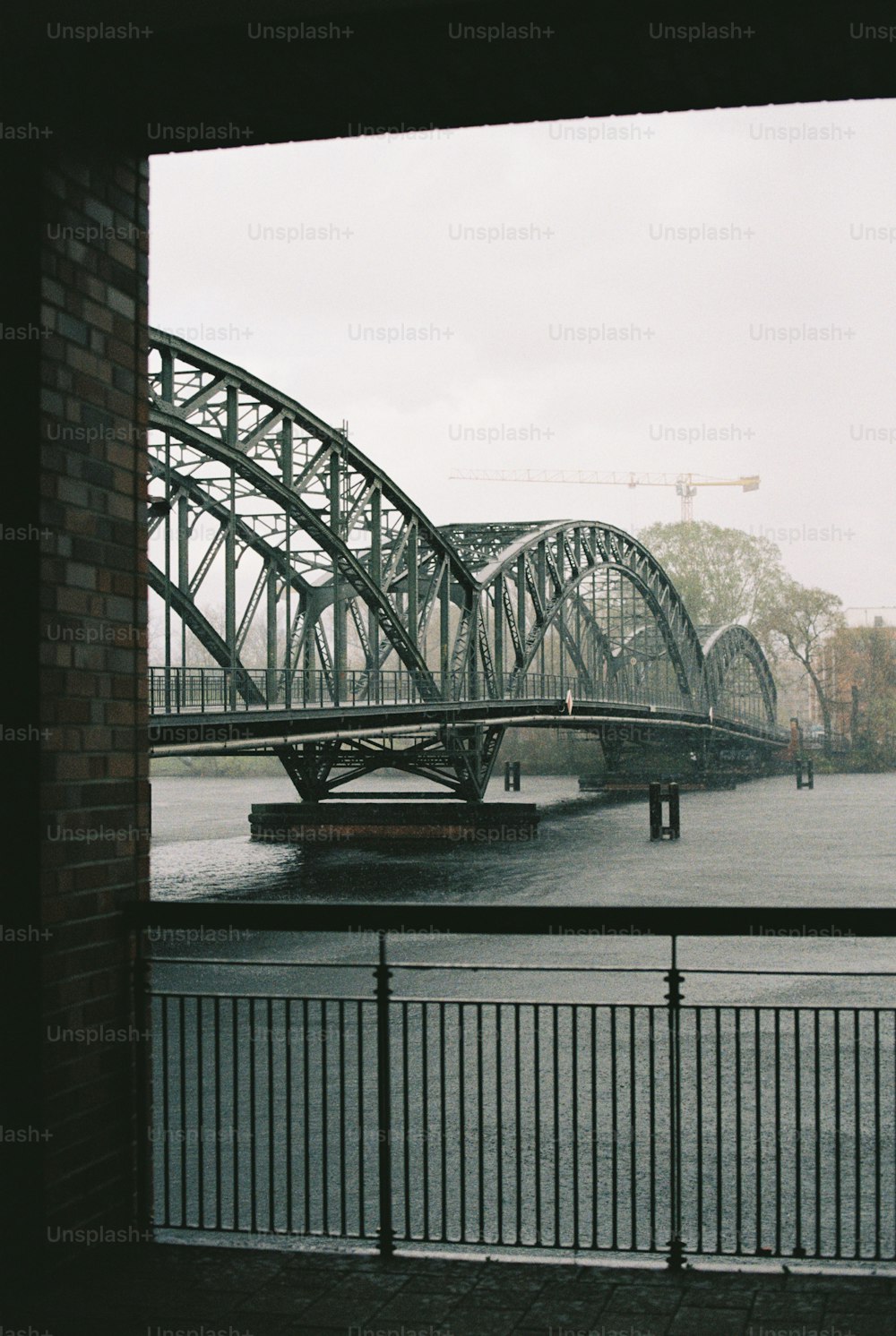 a view of a bridge over a body of water