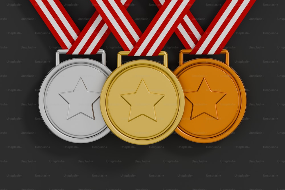 three gold, silver, and bronze medals on a black background