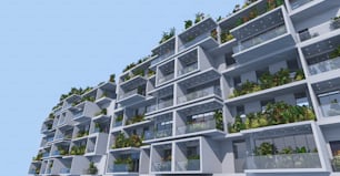 a very tall building with many balconies filled with plants