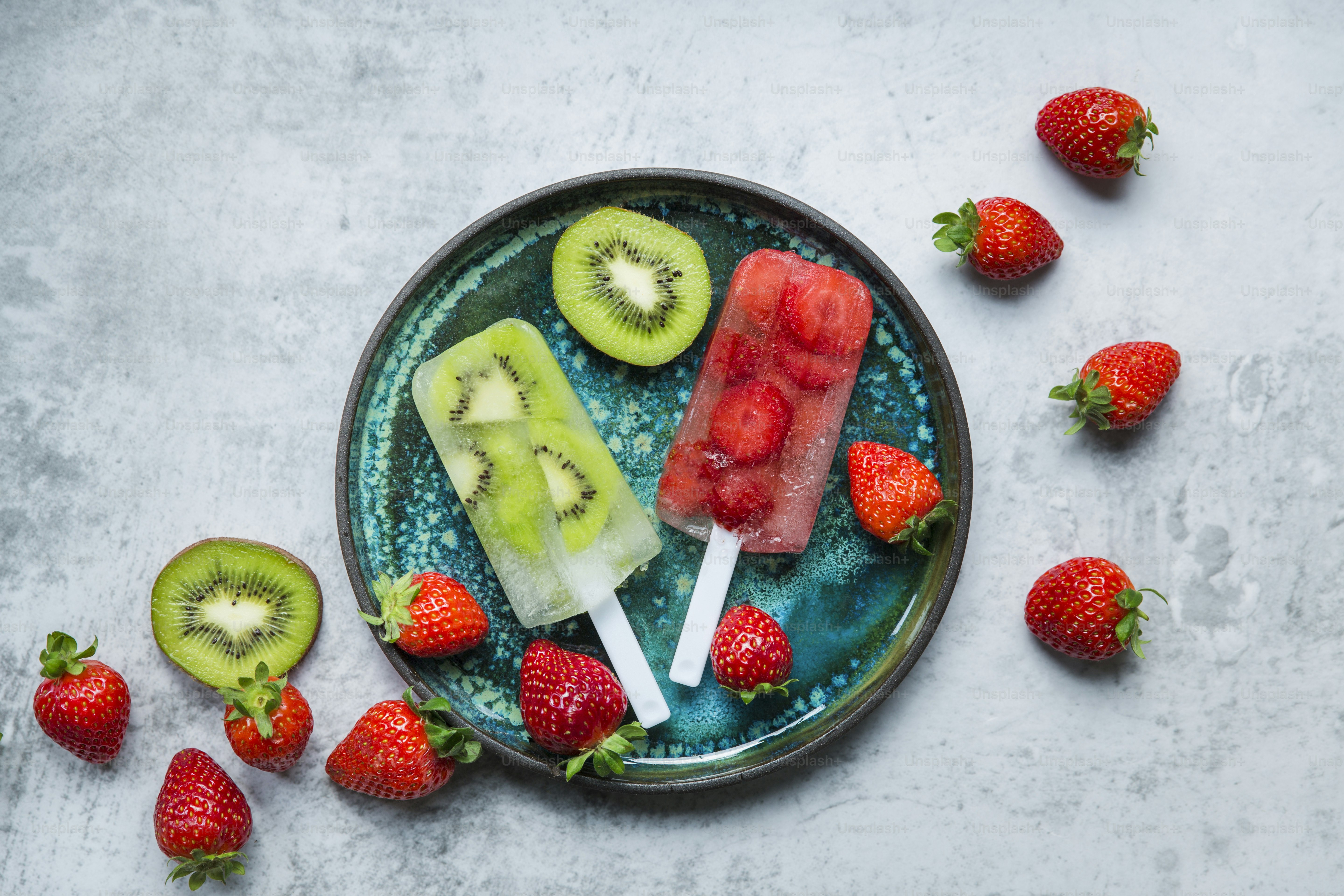 Kiwi and strawberry popsicles