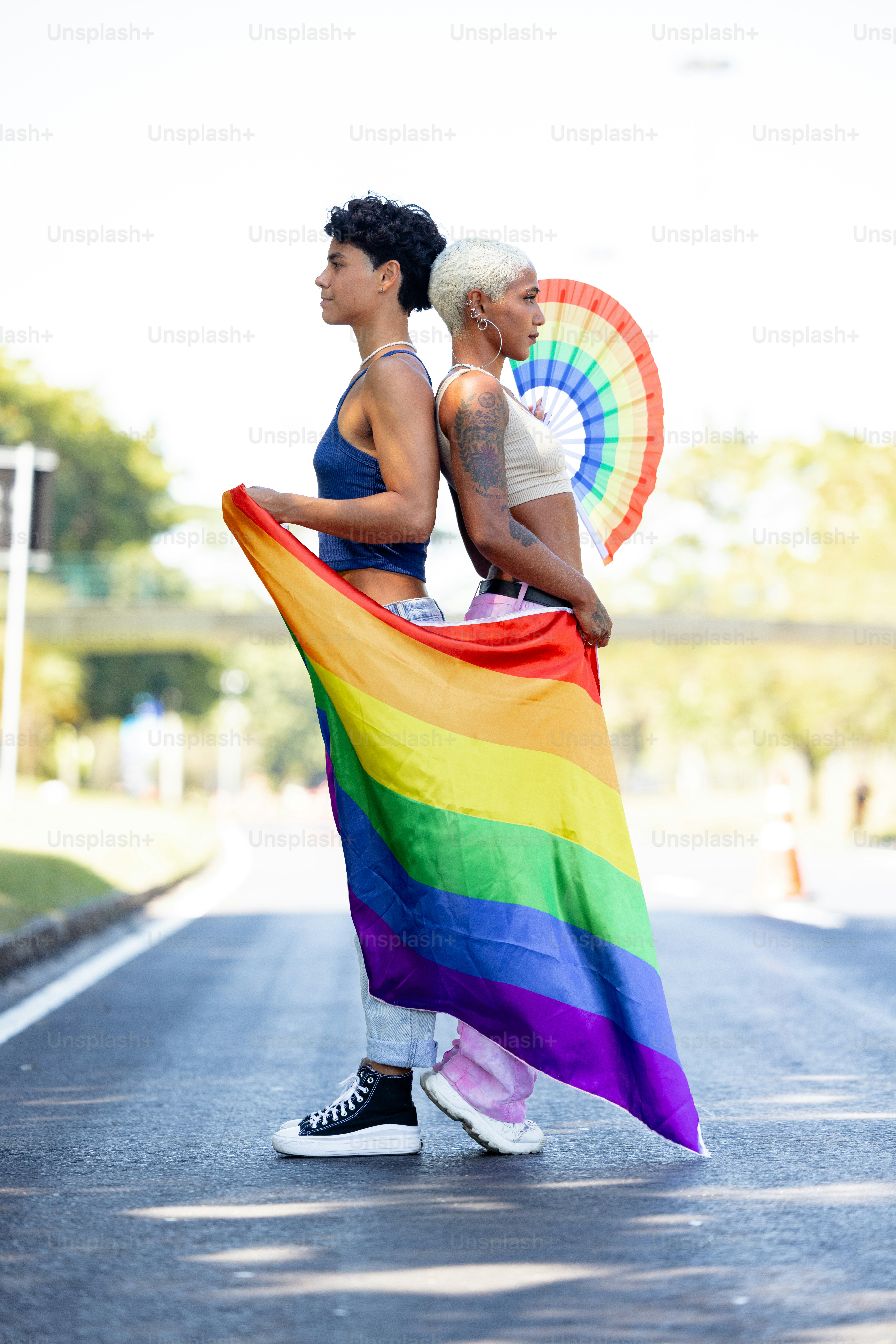 a couple of people that are standing in the street