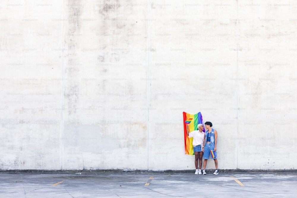 a couple of people standing next to each other