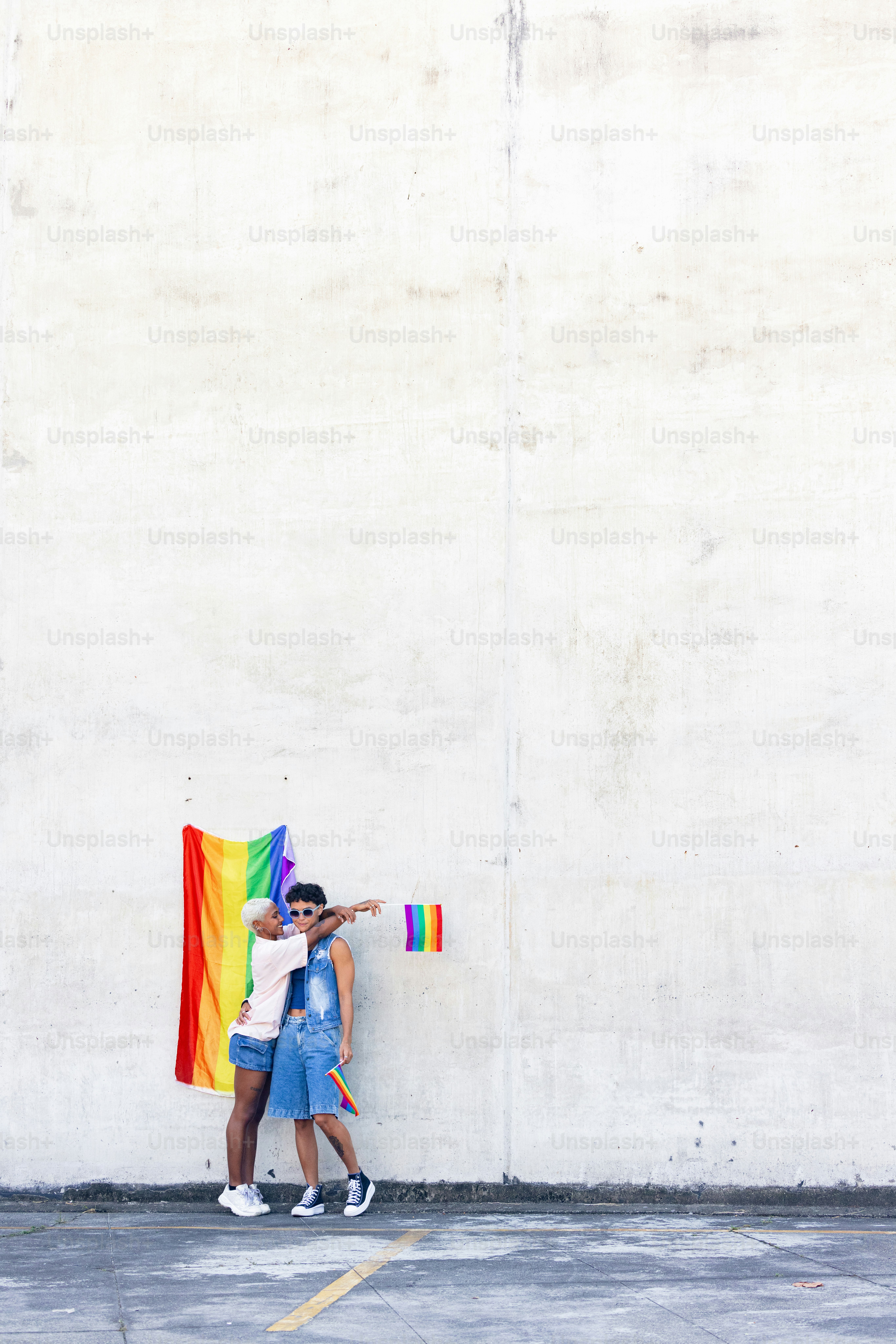 a couple of people standing next to each other