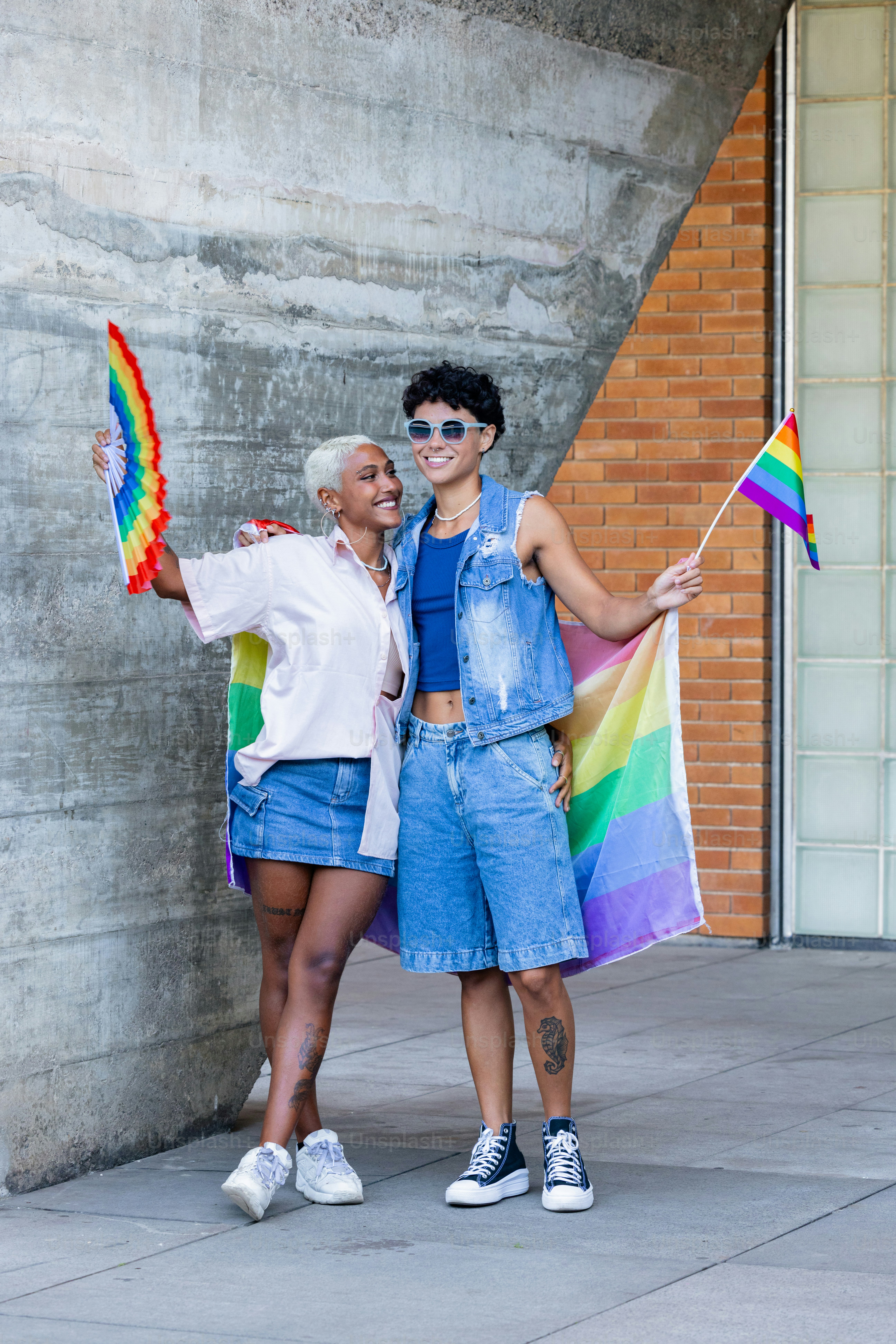 a couple of women standing next to each other