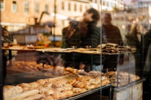 a bunch of food that is in a glass case