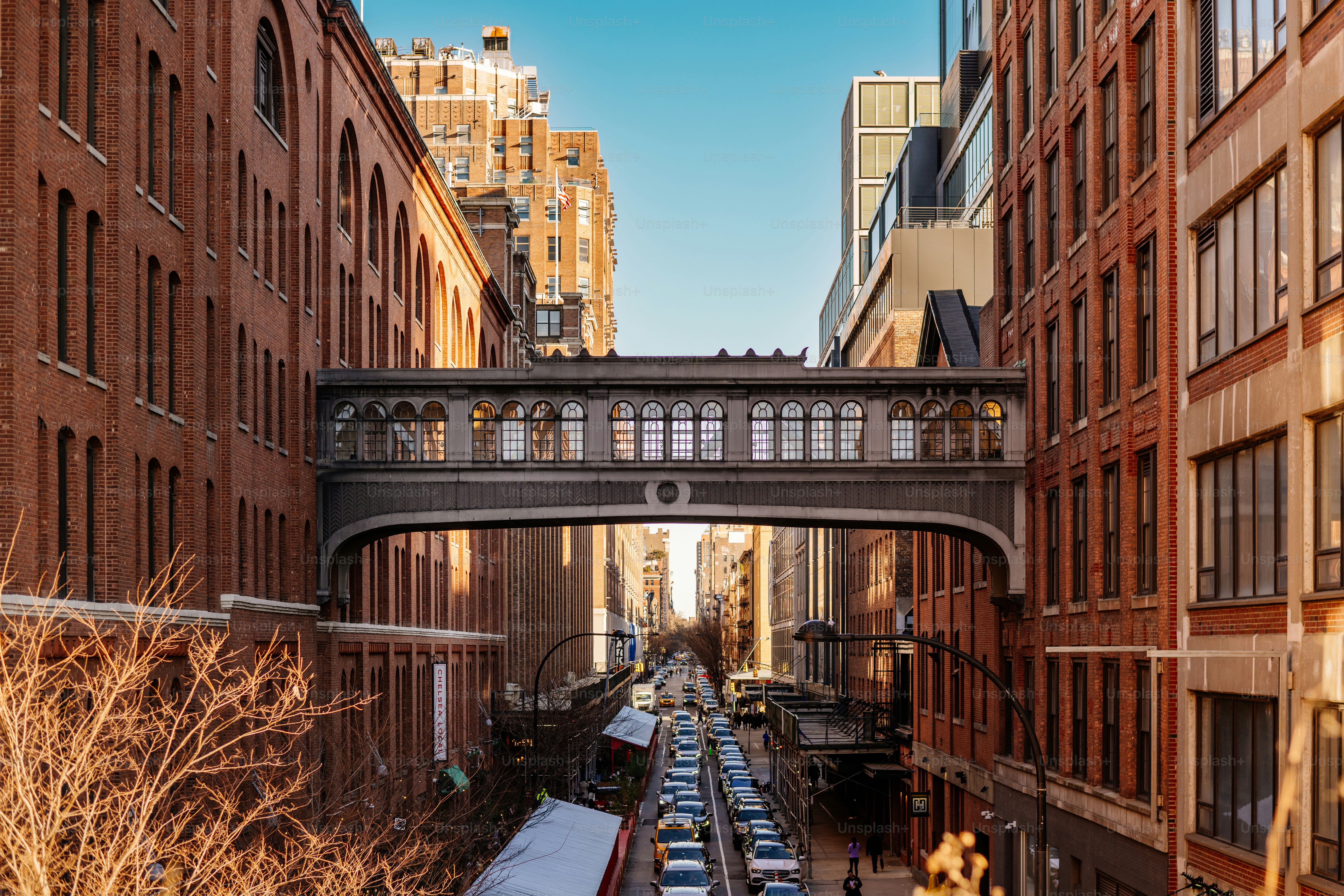 a bridge over a street in a city