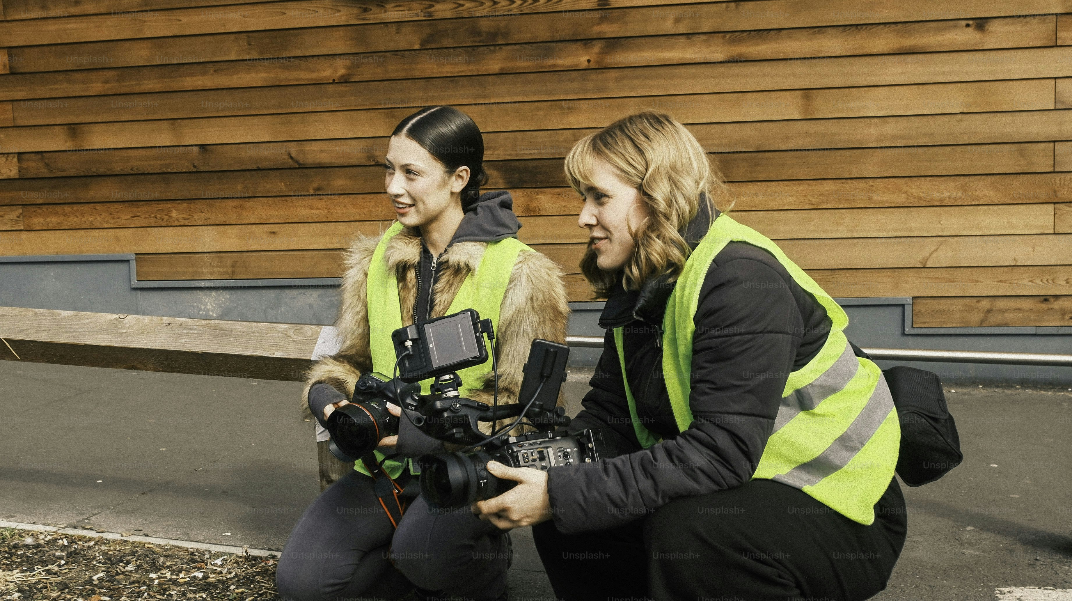 a couple of women sitting next to each other