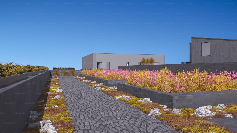 a building with a green roof next to a field of flowers