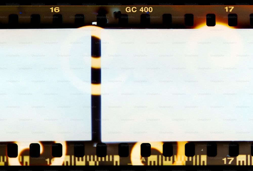 a film strip with two white squares on it