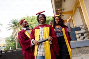 a group of people dressed in graduation gowns