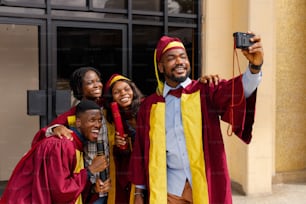 a group of people taking a picture with a camera