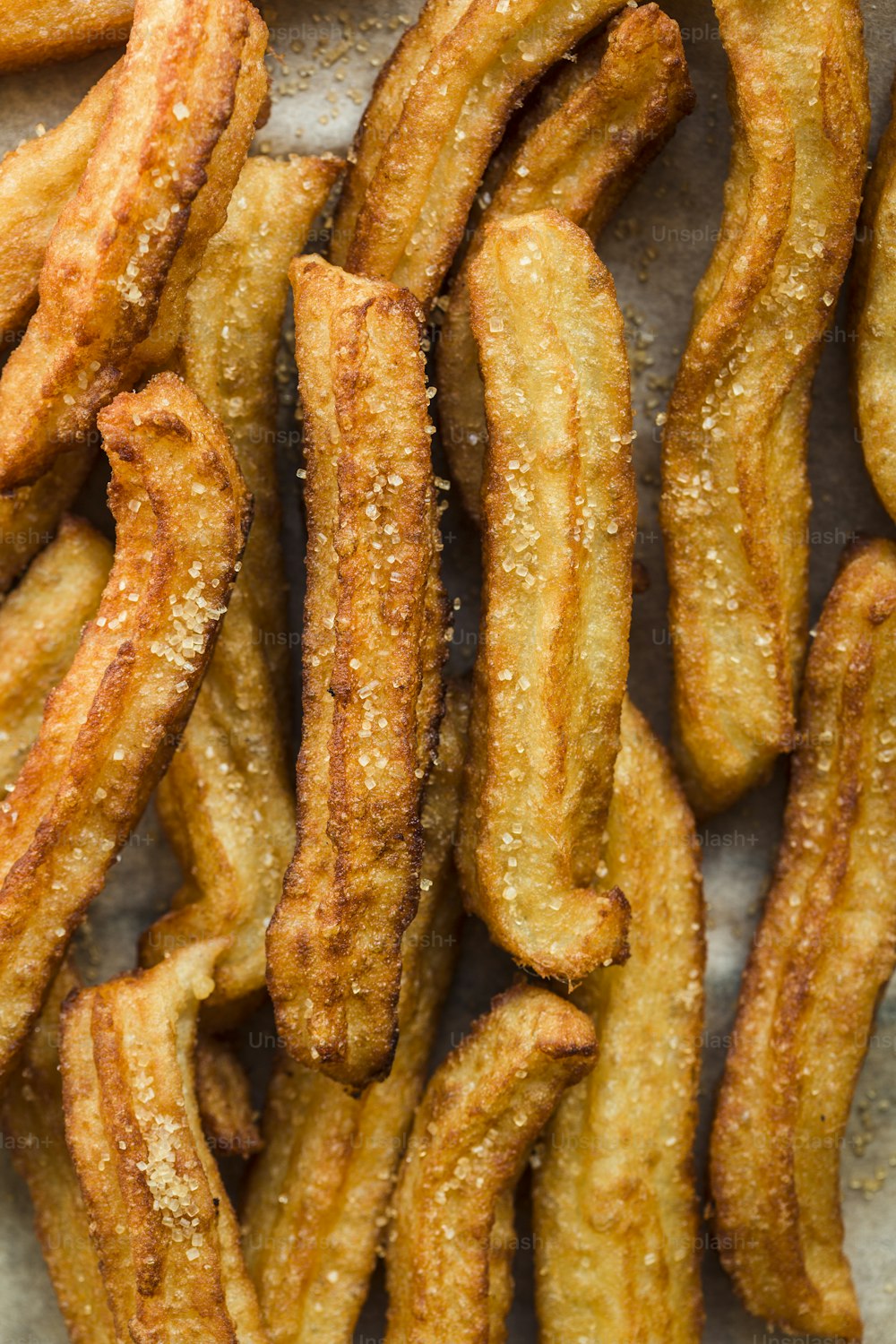 a close up of a pile of fried food