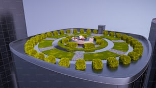 une maquette d’un jardin circulaire avec une maison au centre