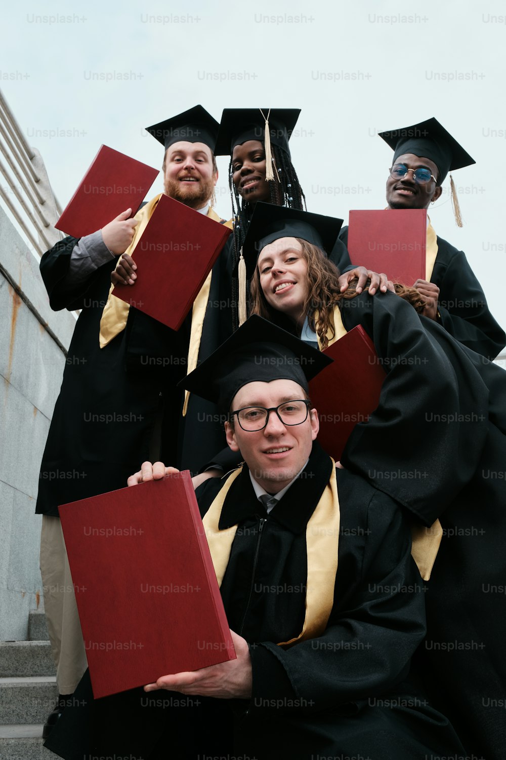 a group of graduates posing for a picture