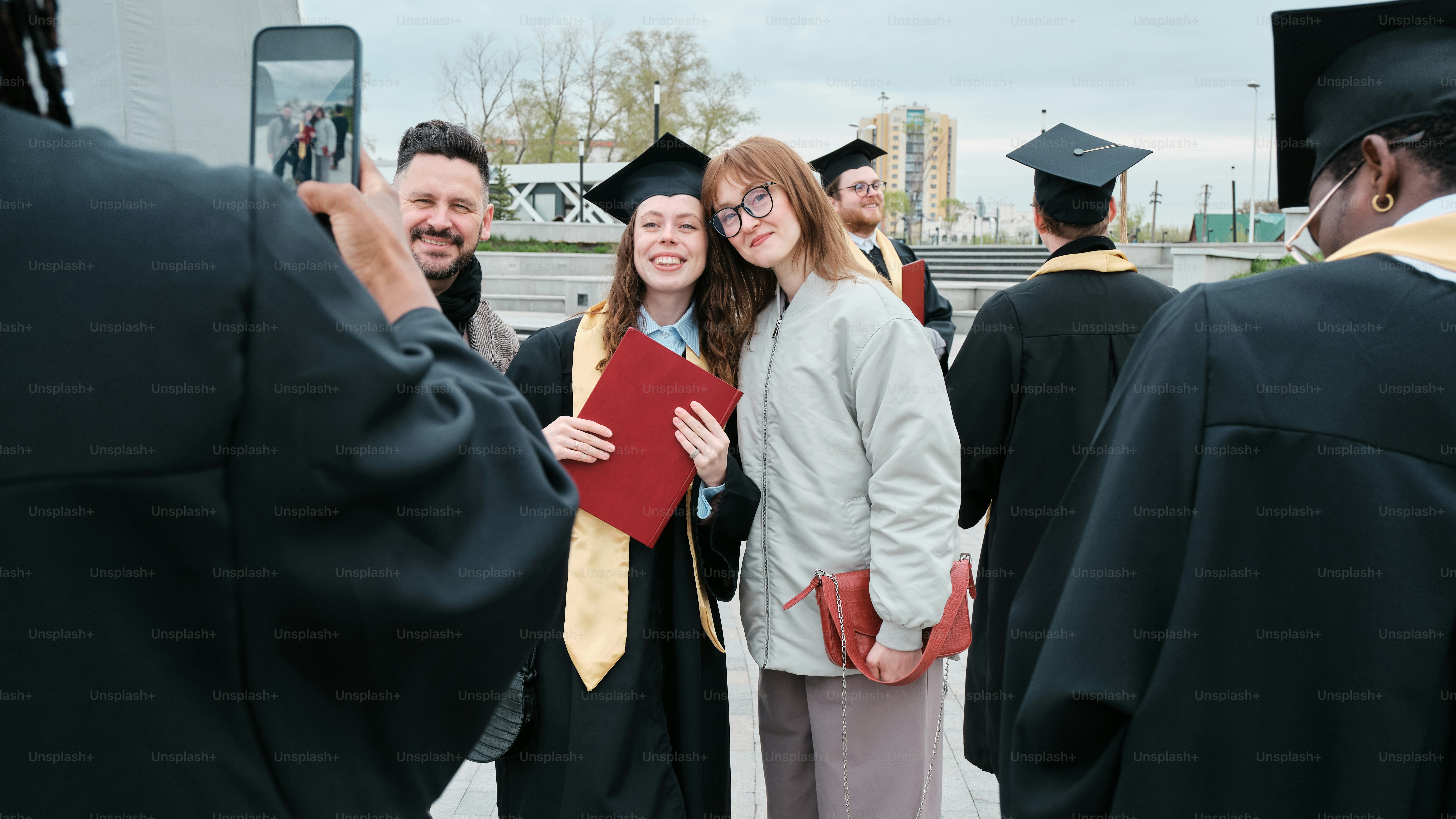 a group of people standing around each other