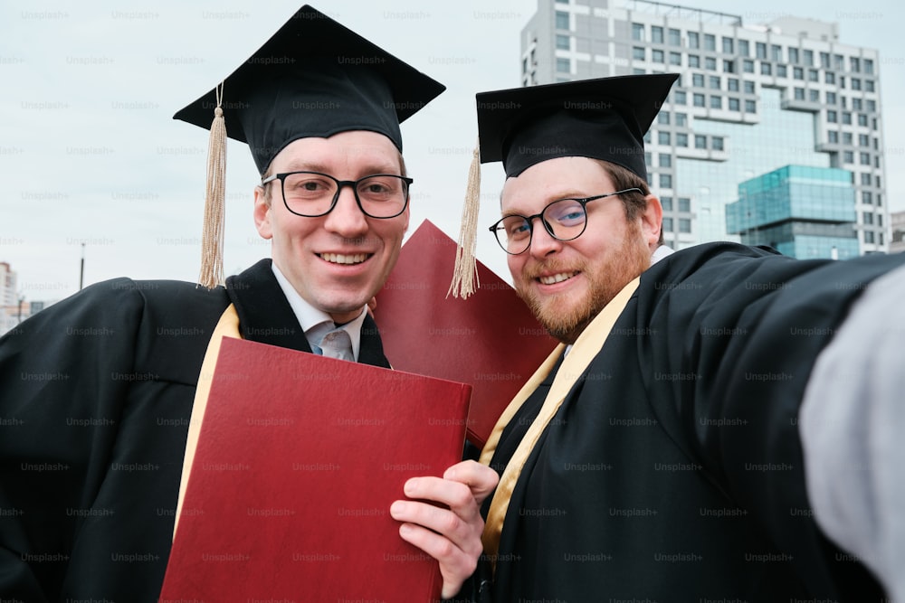 a couple of men standing next to each other