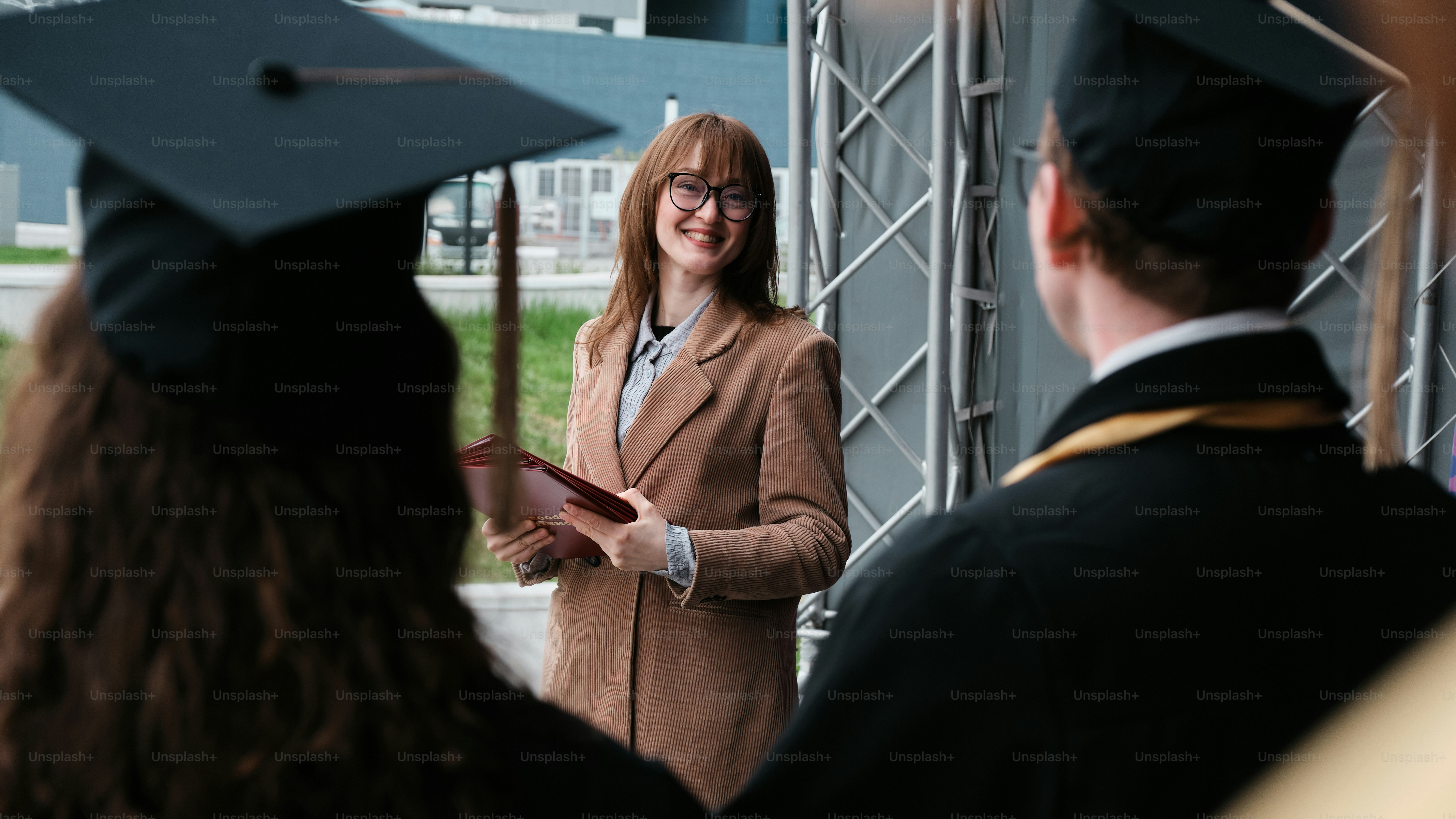a woman in a graduation cap and gown