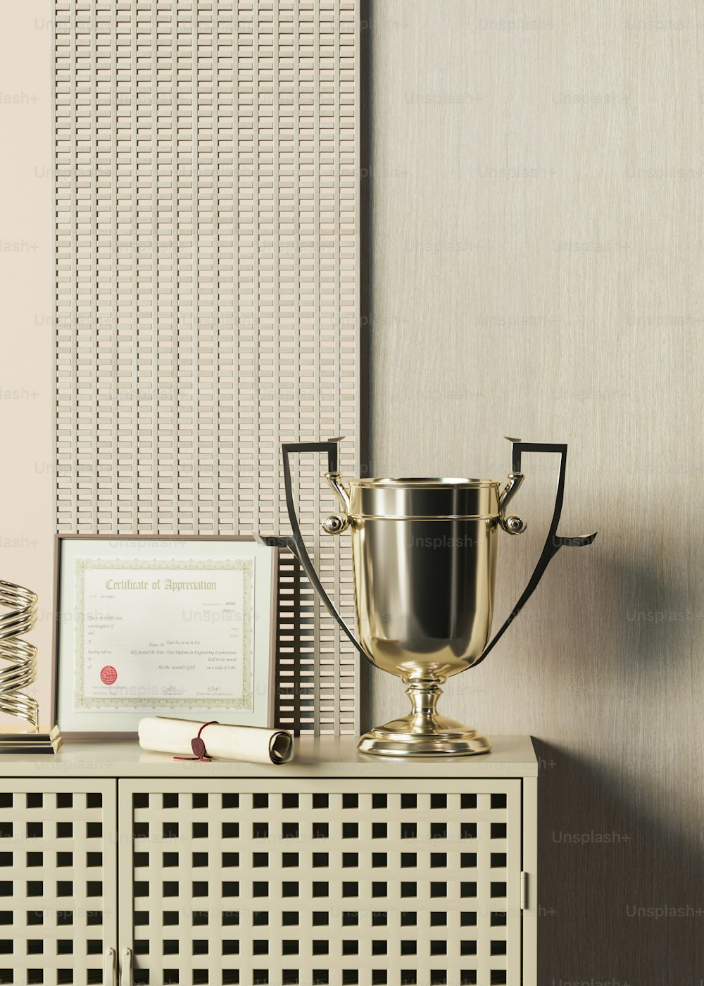 a gold trophy sitting on top of a white cabinet