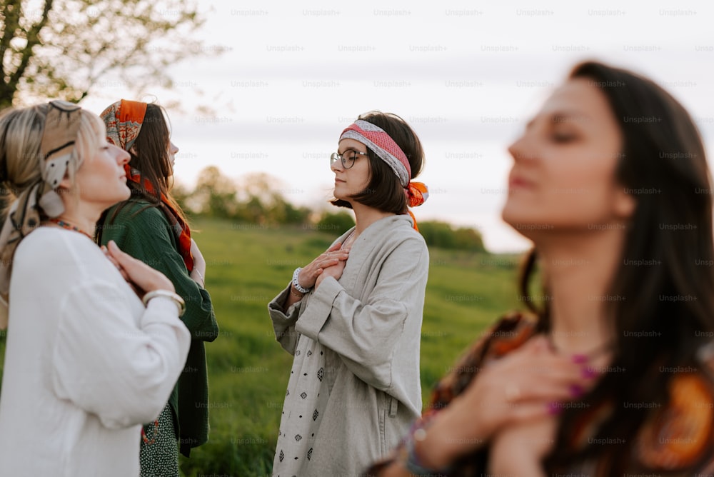 a group of women standing next to each other