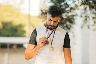 a man with a medal around his neck