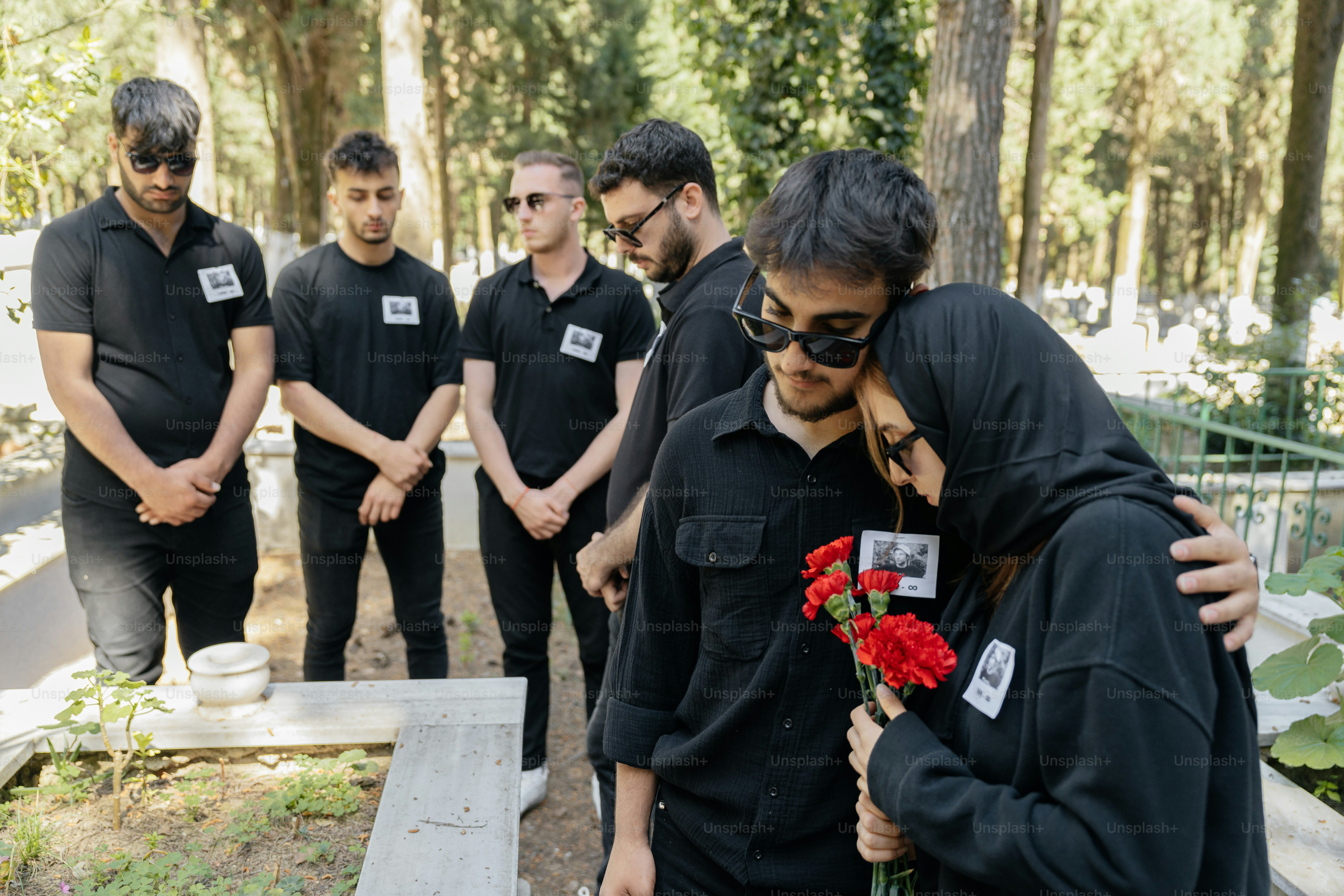 a group of men standing next to each other