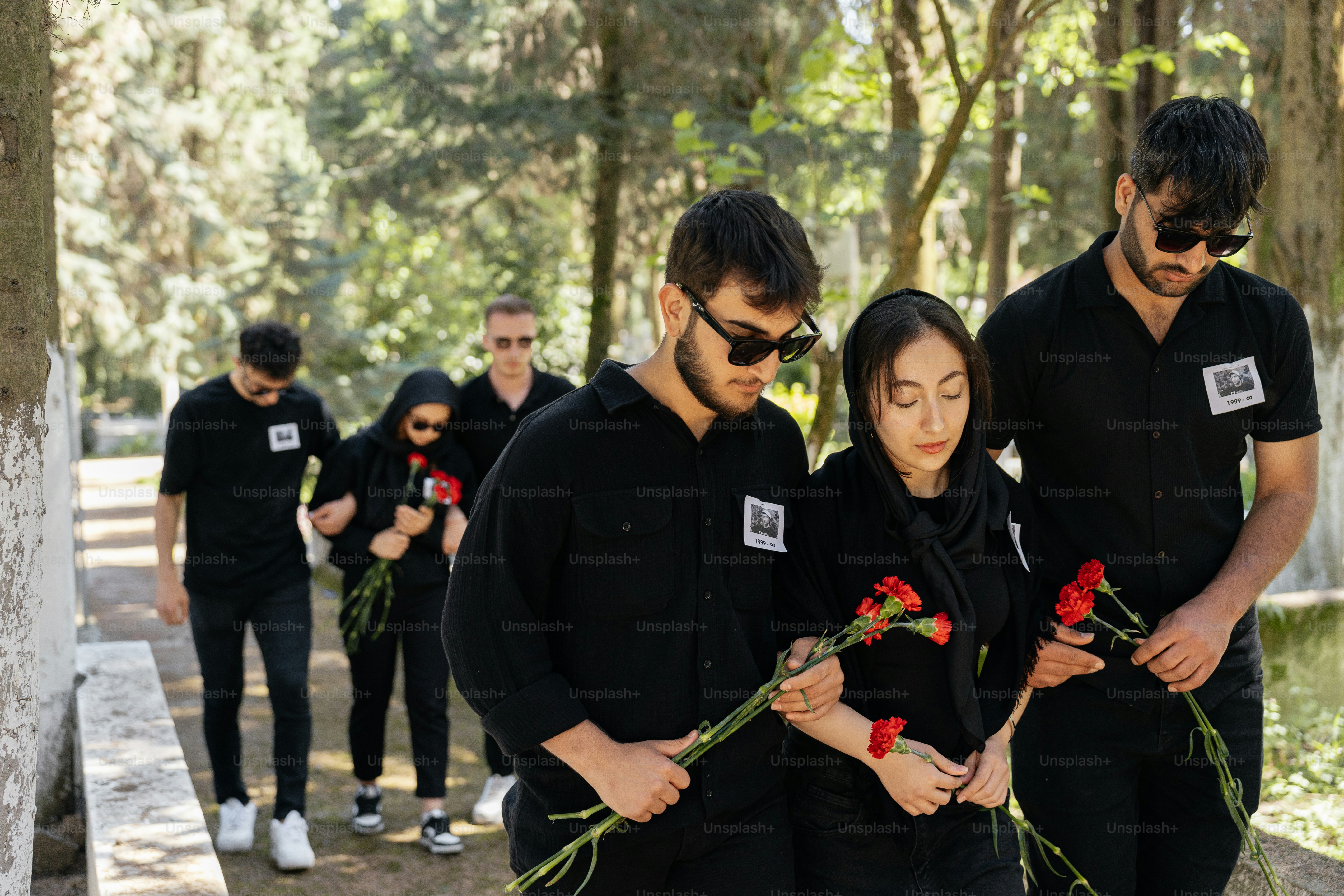 a group of people standing next to each other