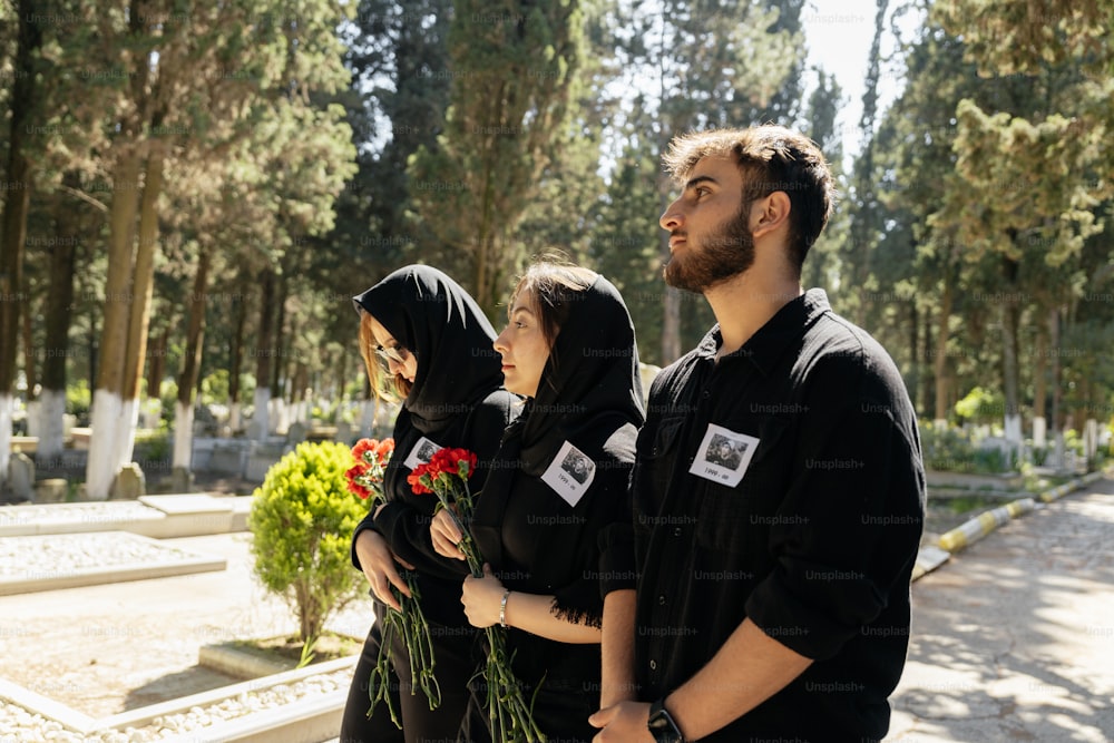 a group of people standing next to each other