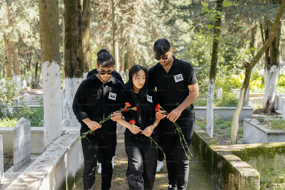 a group of people standing next to each other