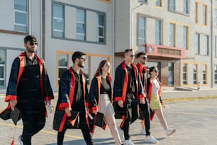 a group of people walking down a street