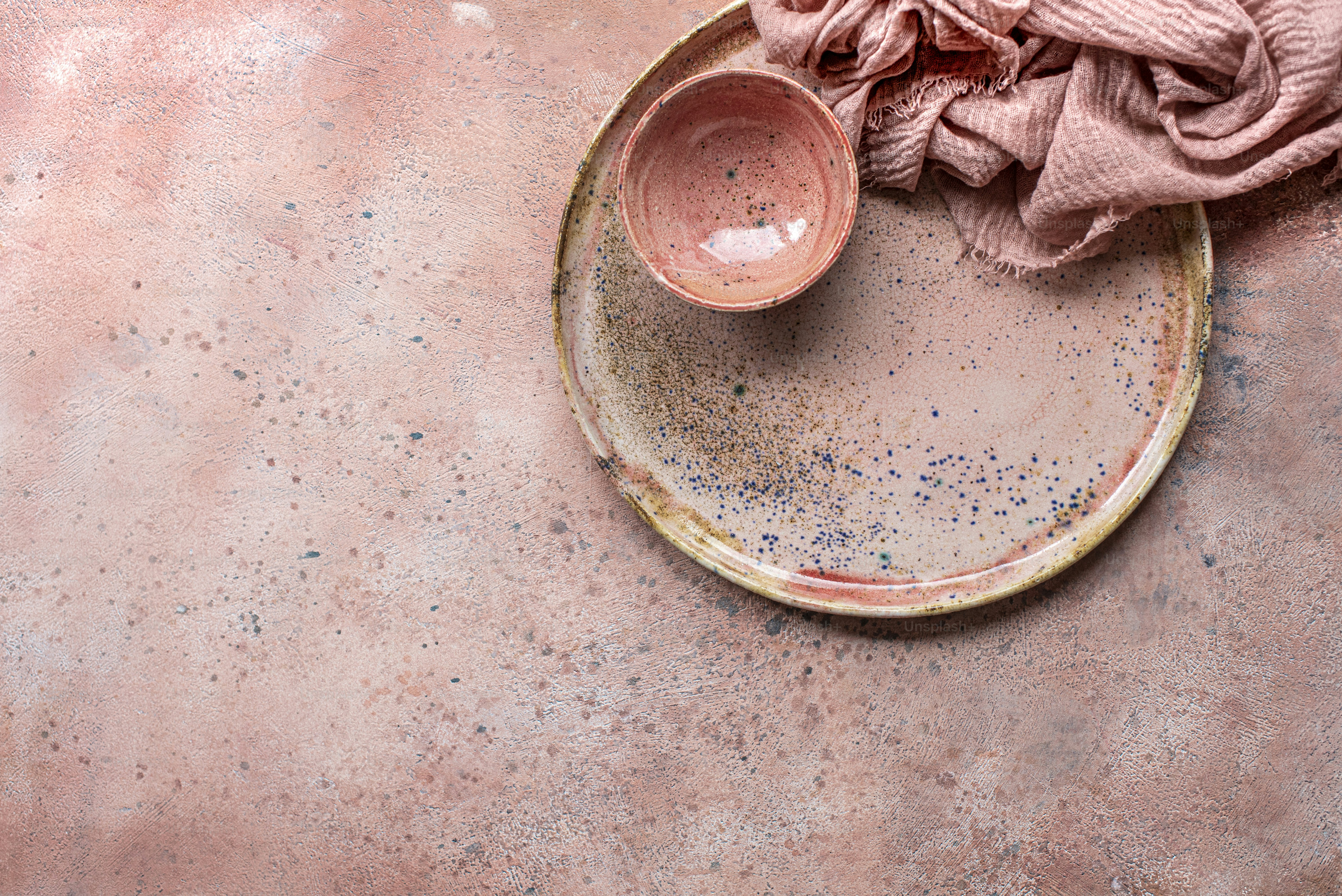 a dirty plate with a dirty cloth on it